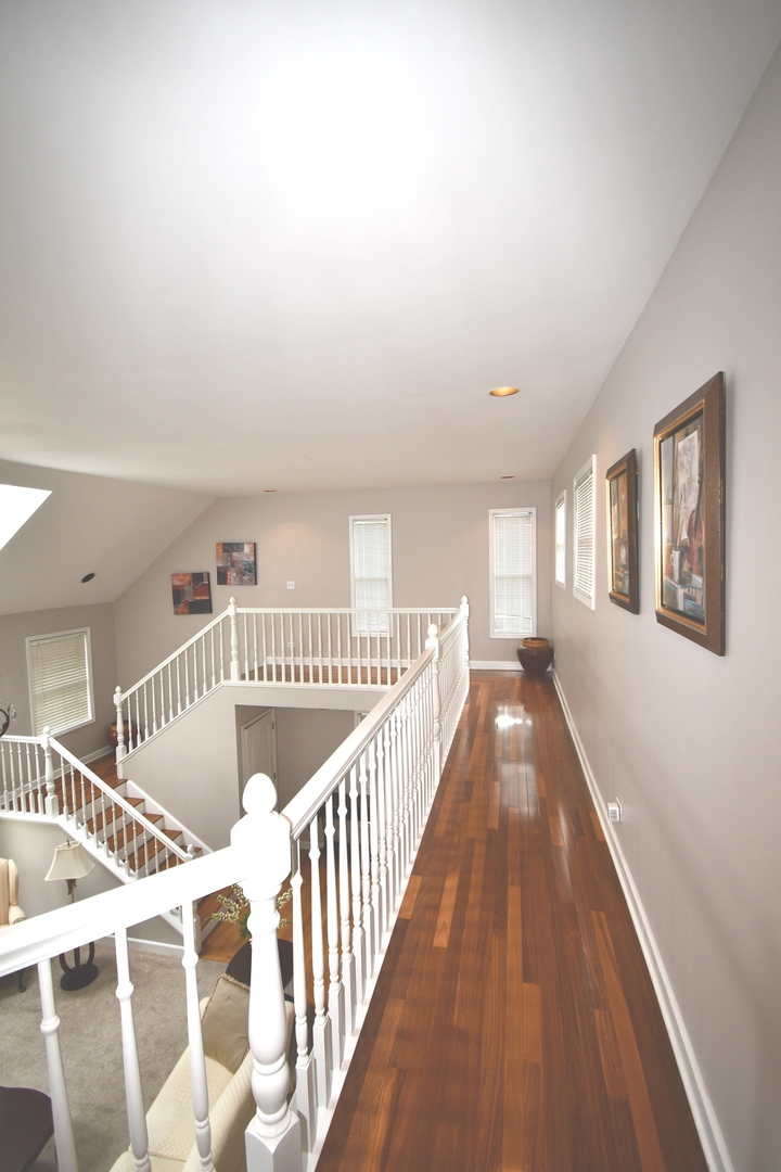 2174 Brookside Lane Aurora, IL 60502 - Photo 25 of 32 a view of a hallway with windows
