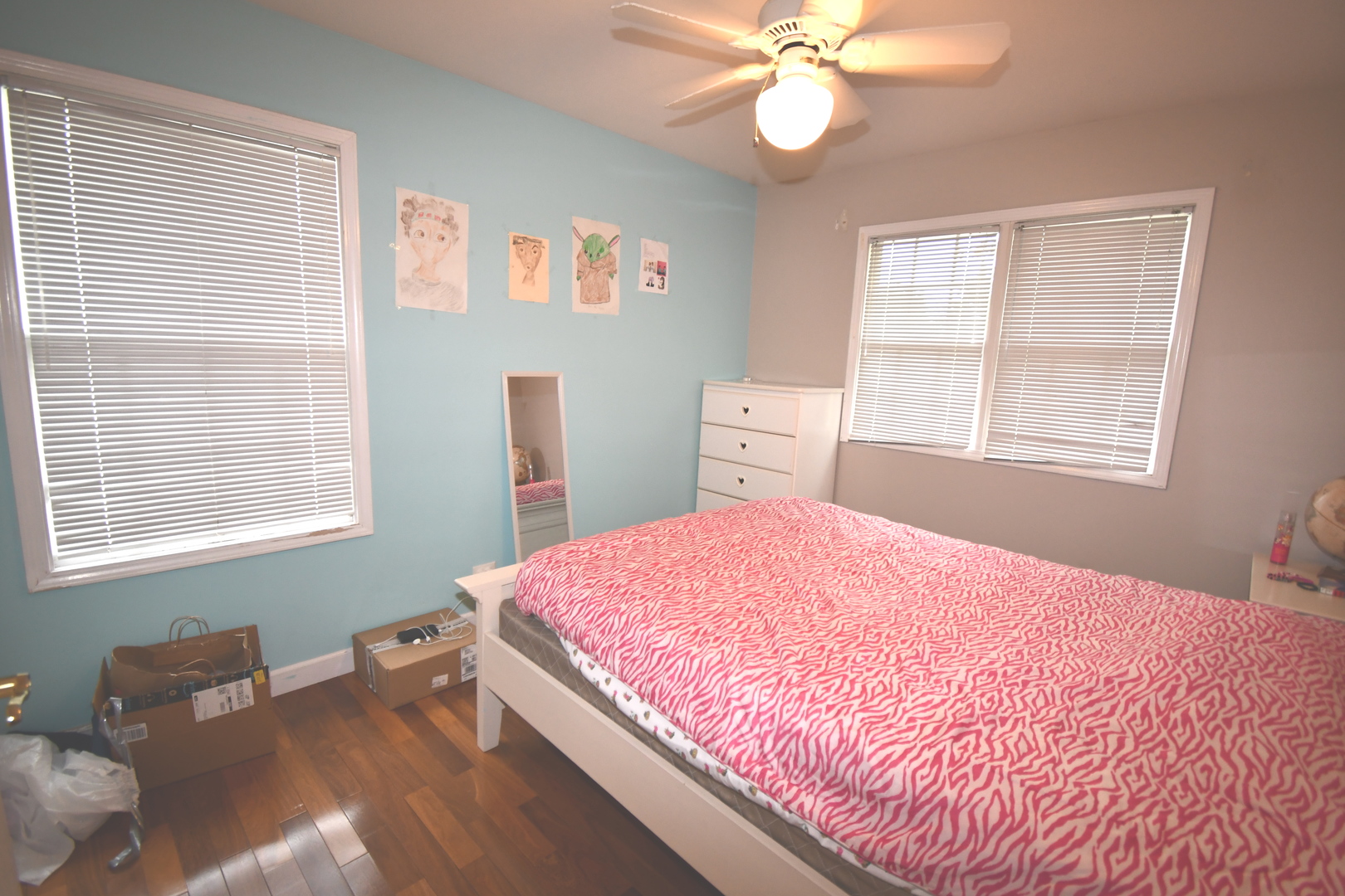 2174 Brookside Lane Aurora, IL 60502 - Photo 27 of 32 a bedroom with a bed and wooden floor