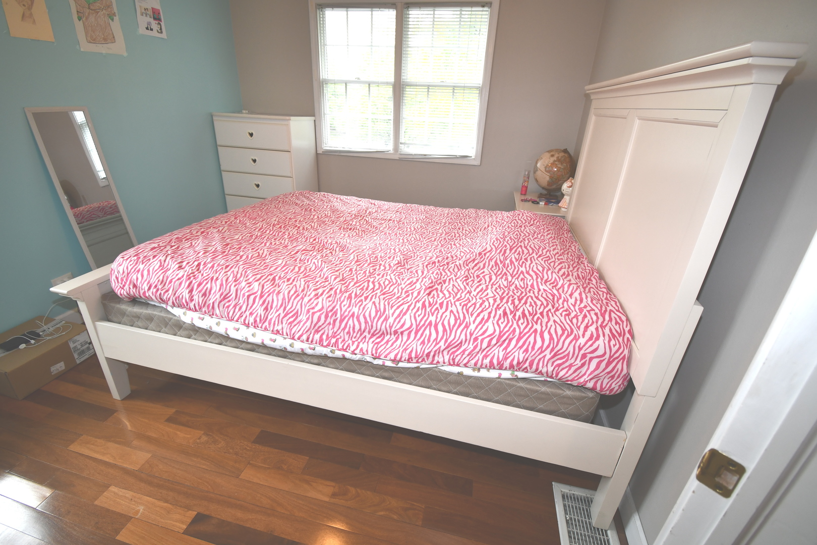 2174 Brookside Lane Aurora, IL 60502 - Photo 29 of 32 a bed sitting in a bedroom next to a window