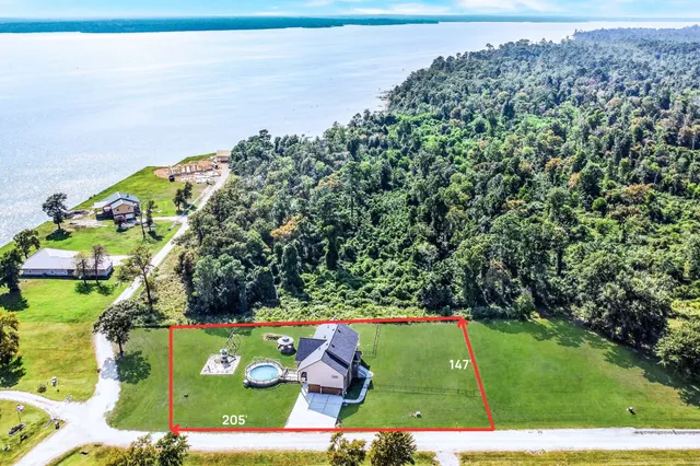 a view of a yard with an outdoor space