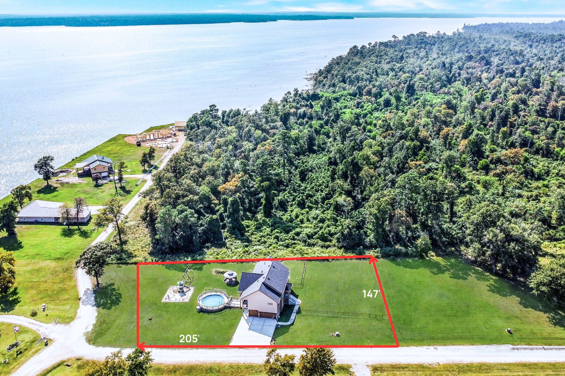 a view of a yard with an outdoor space