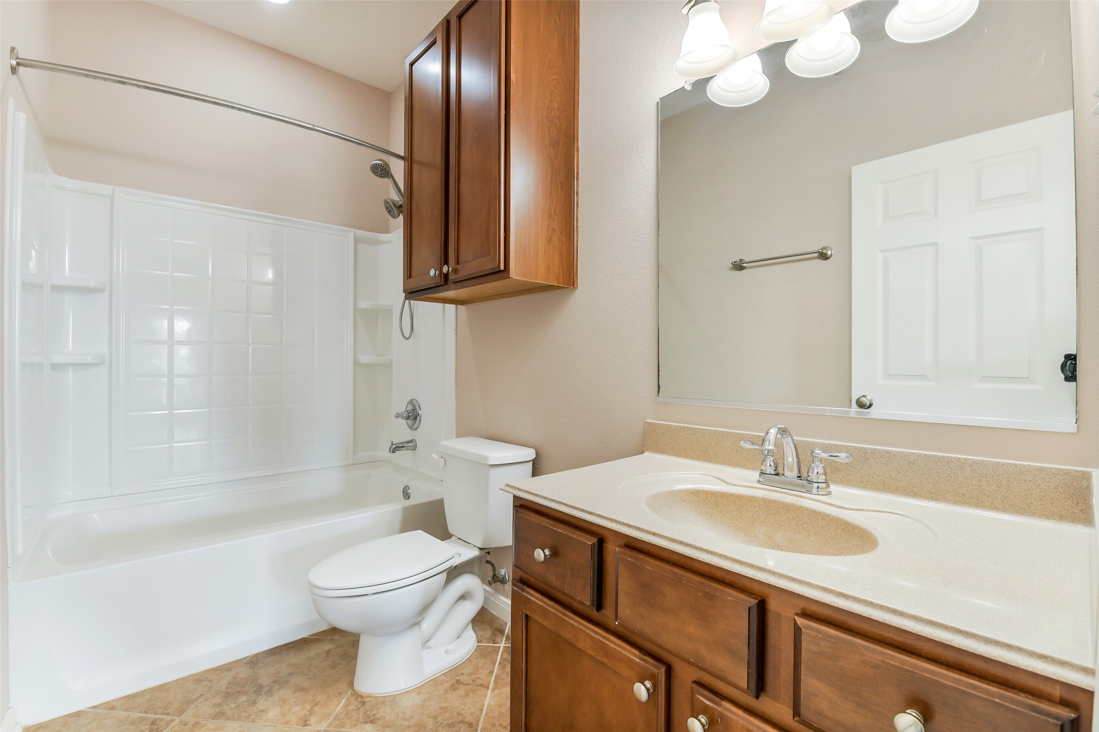 264 Falcon Point Onalaska, TX 77360 - Photo 14 of 33 a bathroom with a sink a toilet and shower
