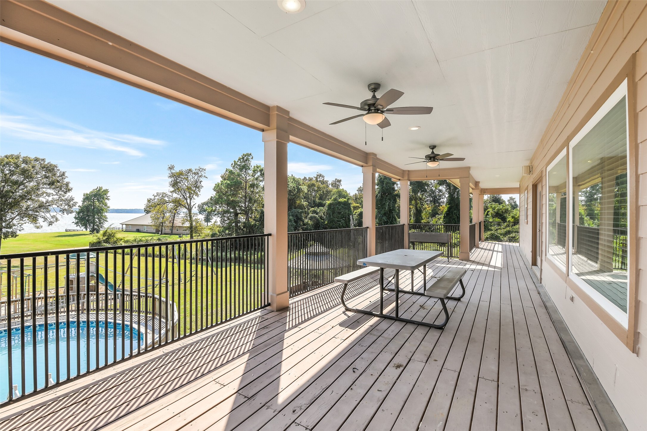 264 Falcon Point Onalaska, TX 77360 - Photo 16 of 33 a view of a balcony with wooden floor