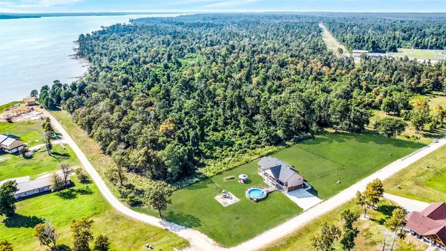 a view of a back yard from a balcony