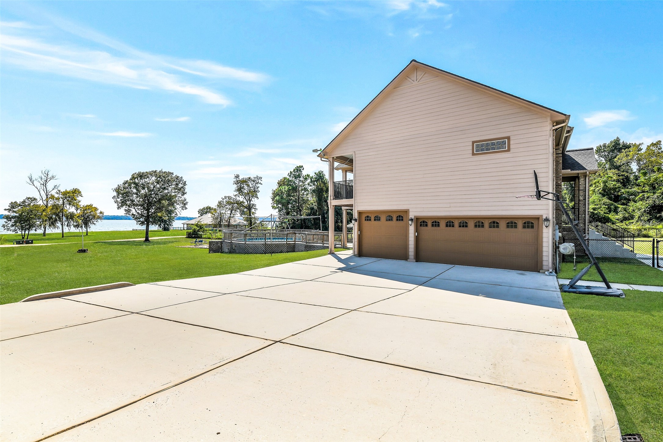 264 Falcon Point Onalaska, TX 77360 - Photo 26 of 33 a view of swimming pool with a yard