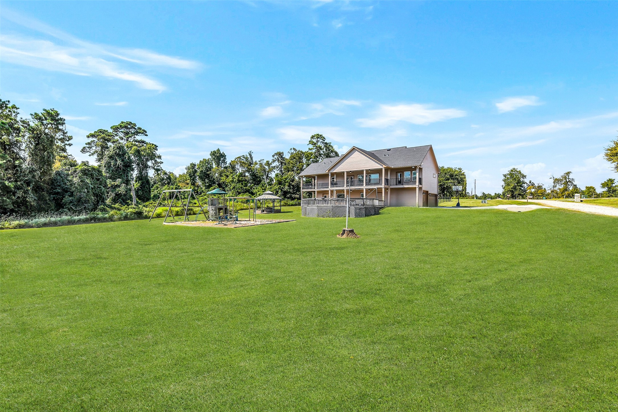 264 Falcon Point Onalaska, TX 77360 - Photo 29 of 33 a view of a house with a backyard