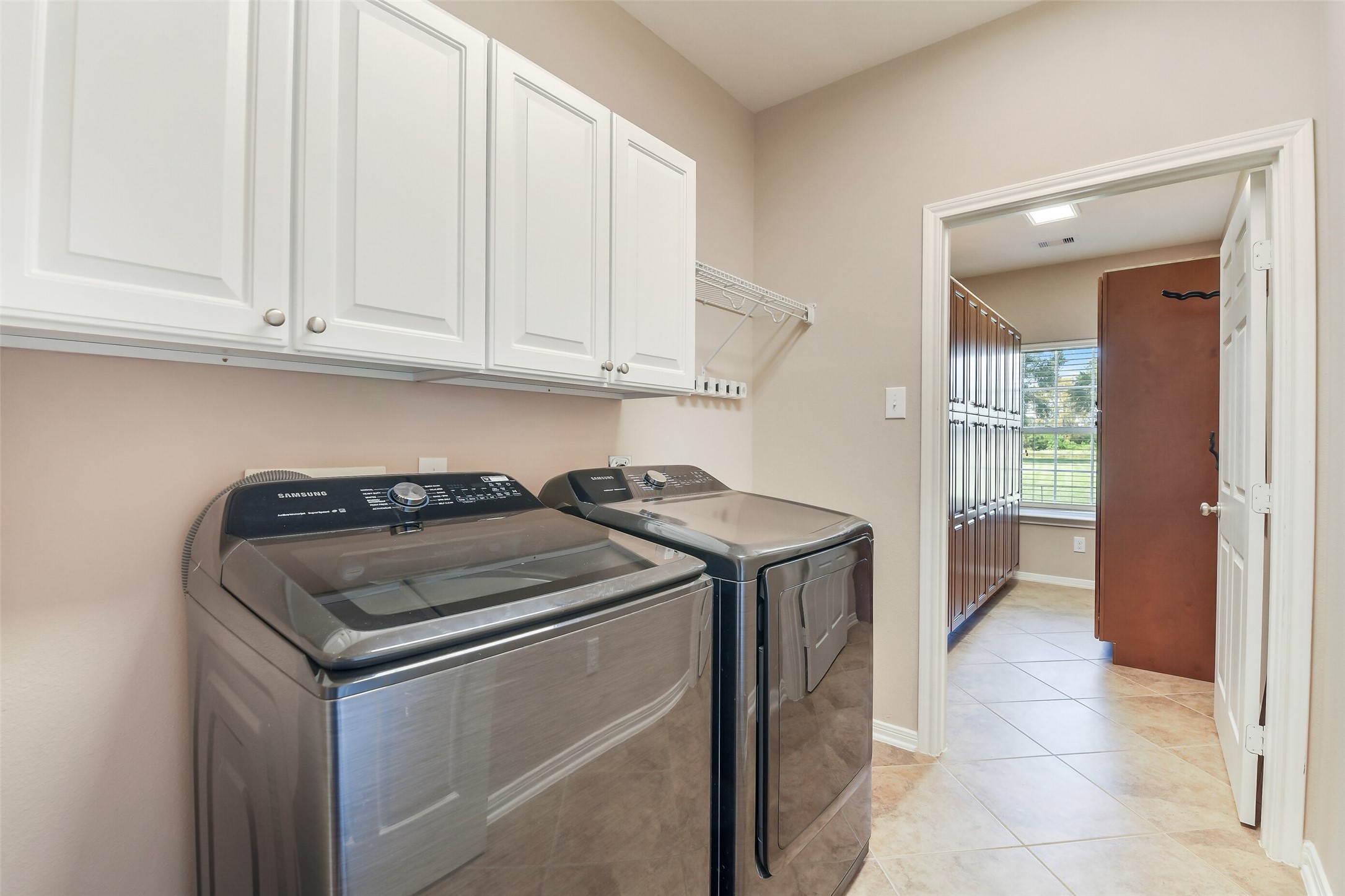 264 Falcon Point Onalaska, TX 77360 - Photo 9 of 33 a utility room with dryer and washer
