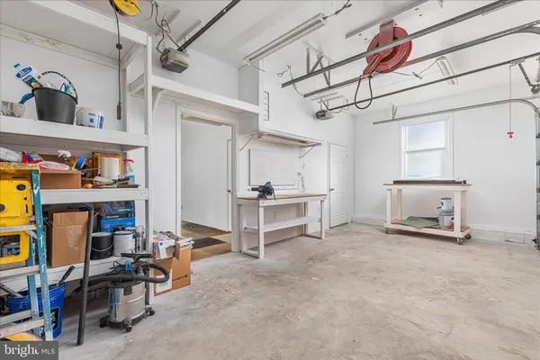 a black and white photo of a living room
