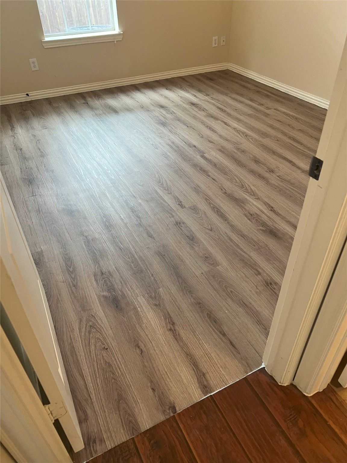 5615 Winsome Lane, Unit H Houston, TX 77057 - Photo 16 of 24 a view of wooden floor in an empty room