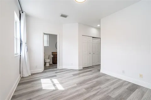 a view of entryway with wooden floor