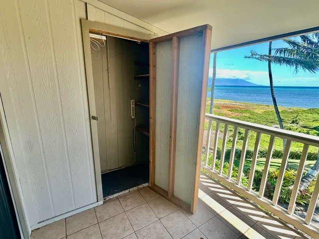 a view of swimming pool with a lounge chair