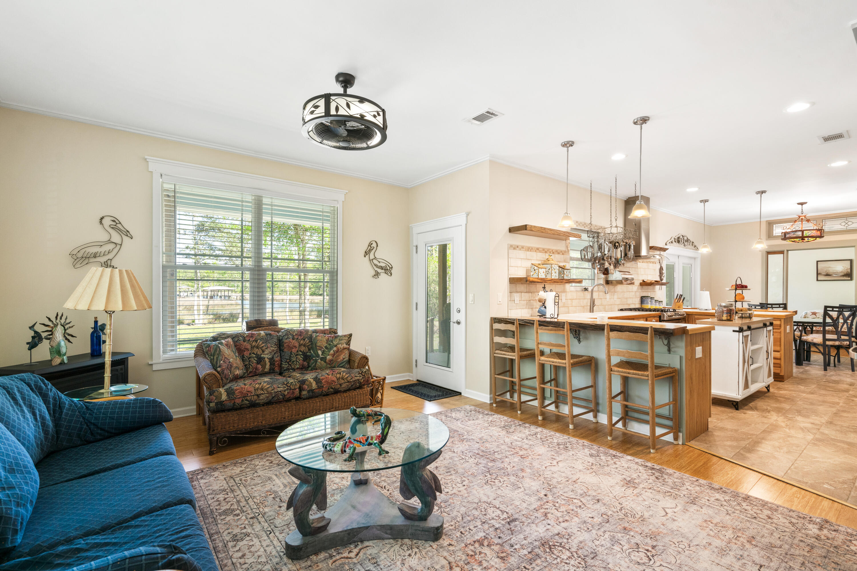 528 Bay Grove Road Freeport, FL 32439 - Photo 21 of 68 a living room with furniture and a large window