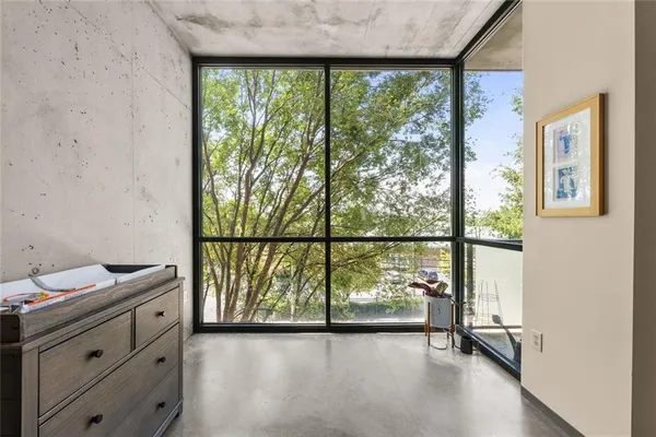 a view of a room with a large window