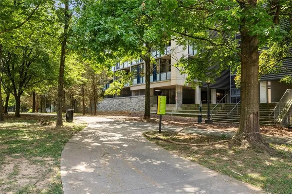 a building with trees in front of it