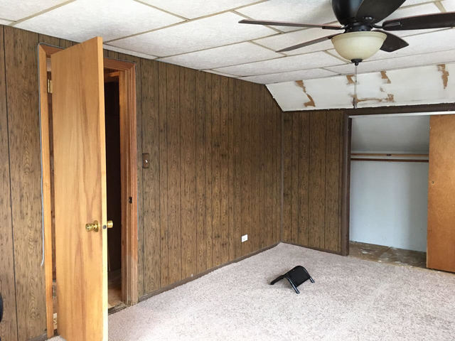 614 Spring Road Ingleside, IL 60041 - Photo 12 of 18 a view of a livingroom with a ceiling fan
