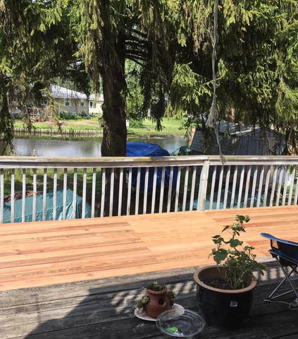614 Spring Road Ingleside, IL 60041 - Photo 13 of 18 a view of a chair and tables on the roof deck