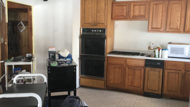 614 Spring Road Ingleside, IL 60041 - Photo 6 of 18 a kitchen with a refrigerator and cabinets