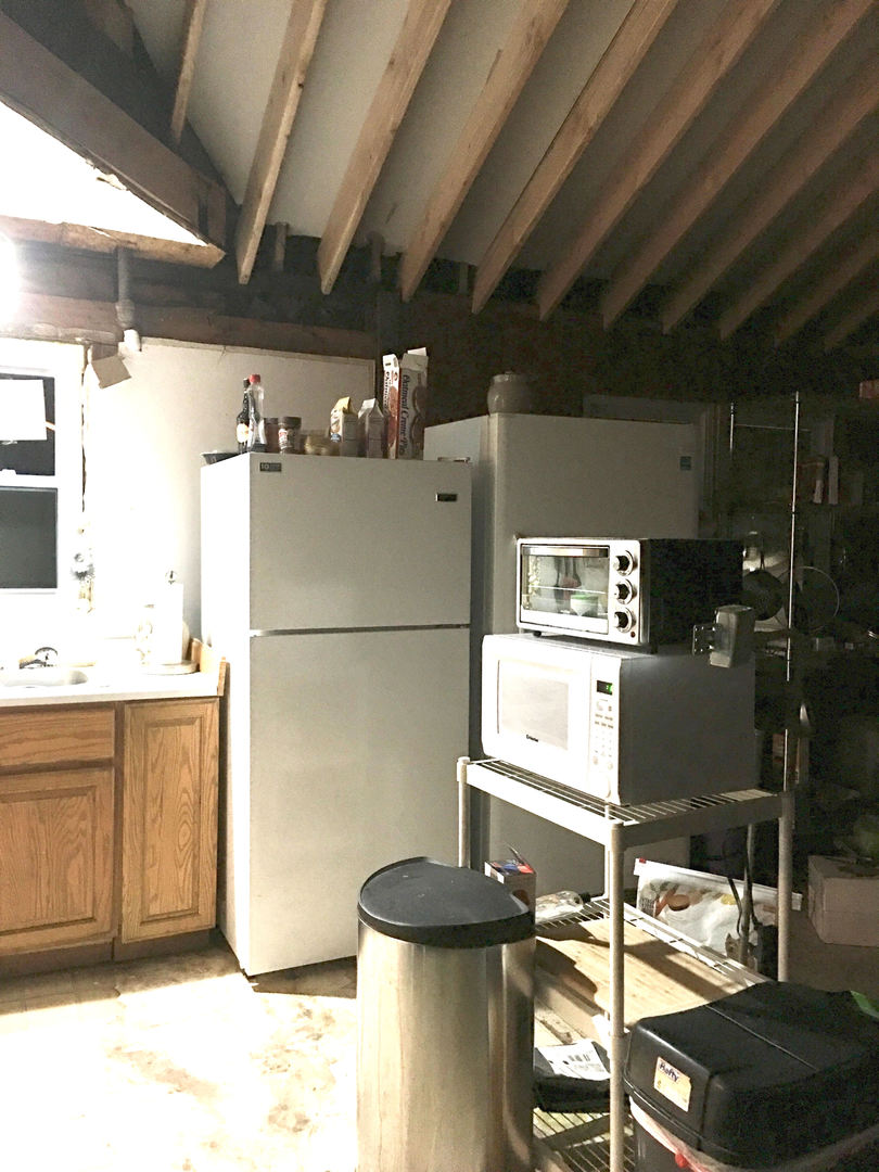 614 Spring Road Ingleside, IL 60041 - Photo 7 of 18 a kitchen with a refrigerator and a stove