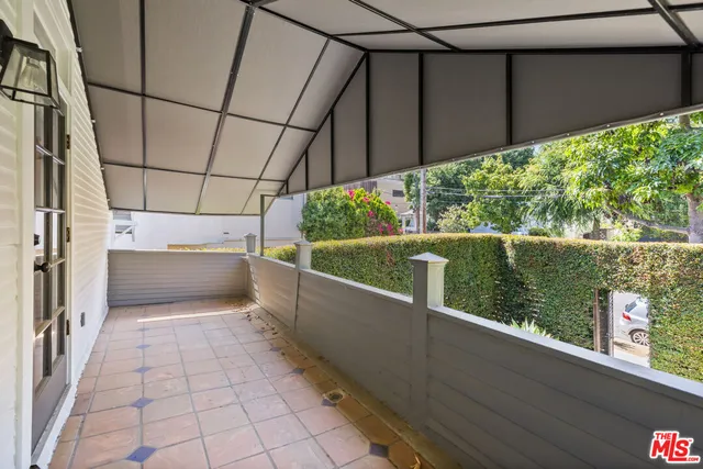 a bathroom with a sink a bathtub and a window
