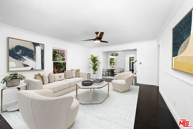 a kitchen with stainless steel appliances a stove a sink and a refrigerator