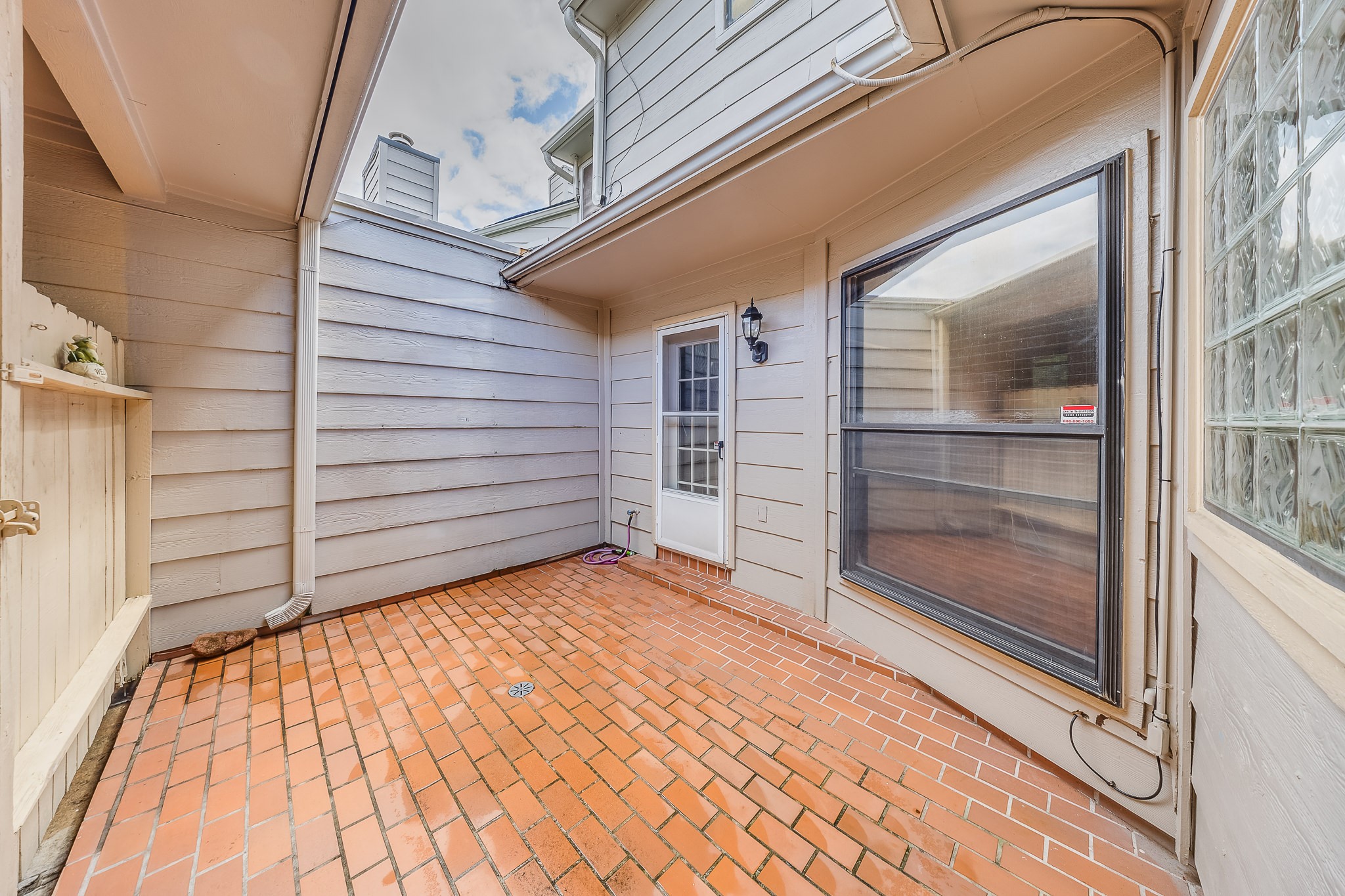 727 Bunker Hill Road, Unit 34 Houston, TX 77024 - Photo 32 of 38 The back patio makes it easy to travel between the home to the garages. This area is perfect to have a private outdoor space for relaxation.