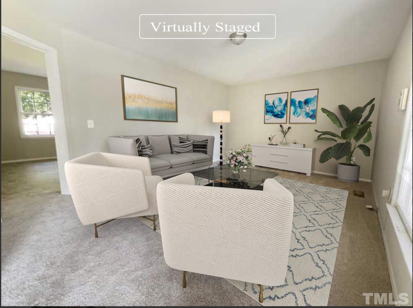 2521 Little John Road Raleigh, NC 27610 - Photo 2 of 18 a living room with furniture and a flat screen tv