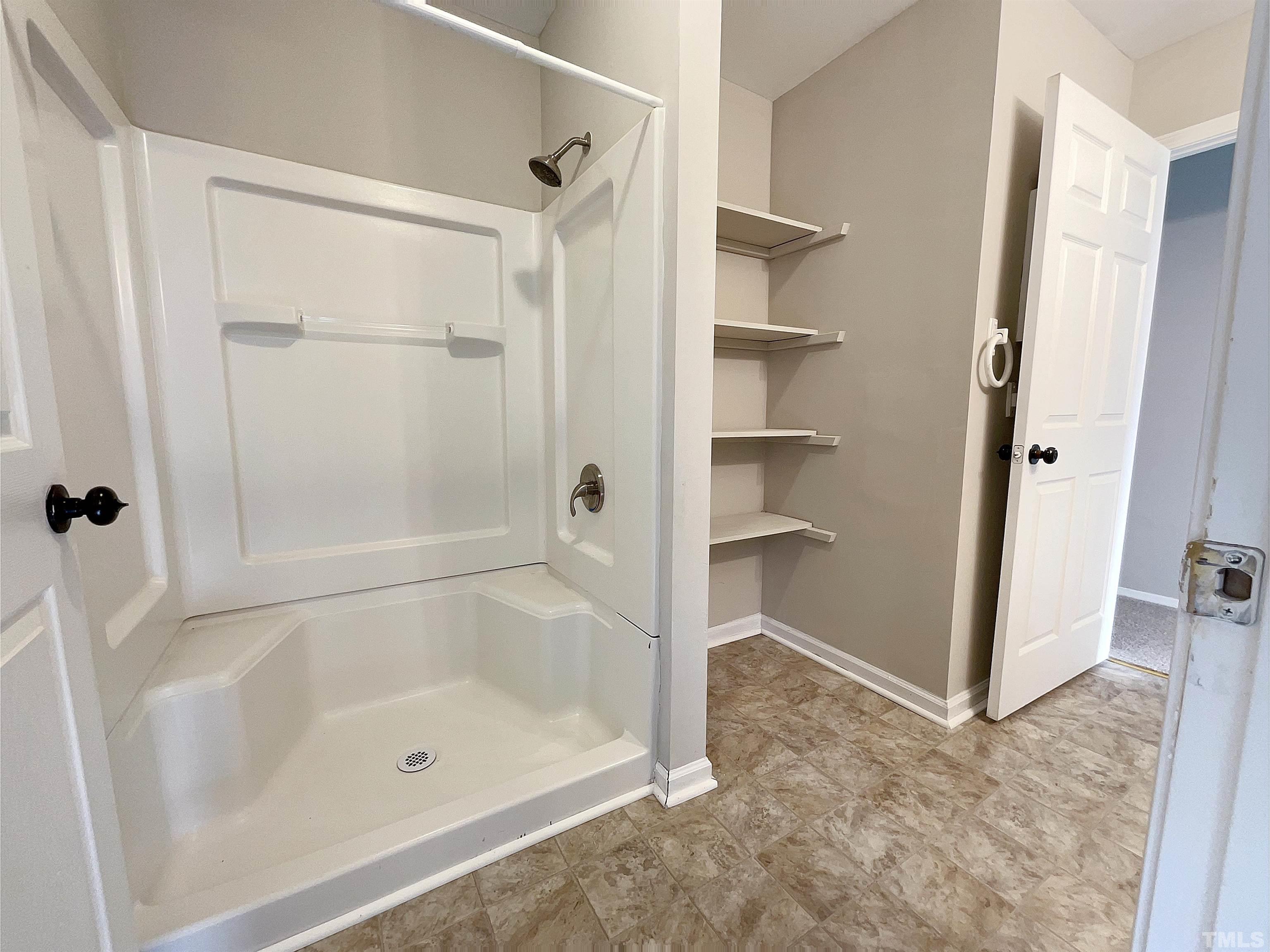 2521 Little John Road Raleigh, NC 27610 - Photo 15 of 18 a bathroom with a bath tub