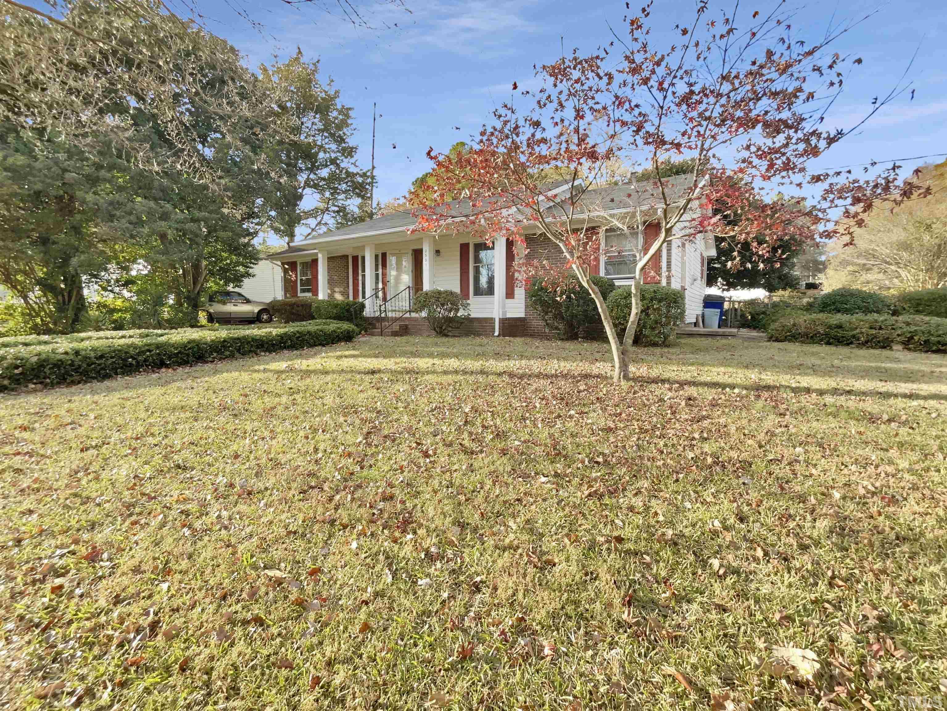 2521 Little John Road Raleigh, NC 27610 - Photo 18 of 18 a front view of a house with a yard
