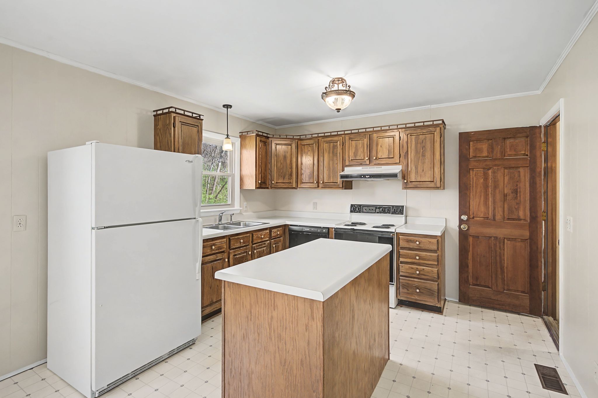 520 Holt Valley Road Nashville, TN 37209 - Photo 12 of 47 a kitchen with stainless steel appliances granite countertop a refrigerator sink stove and oven