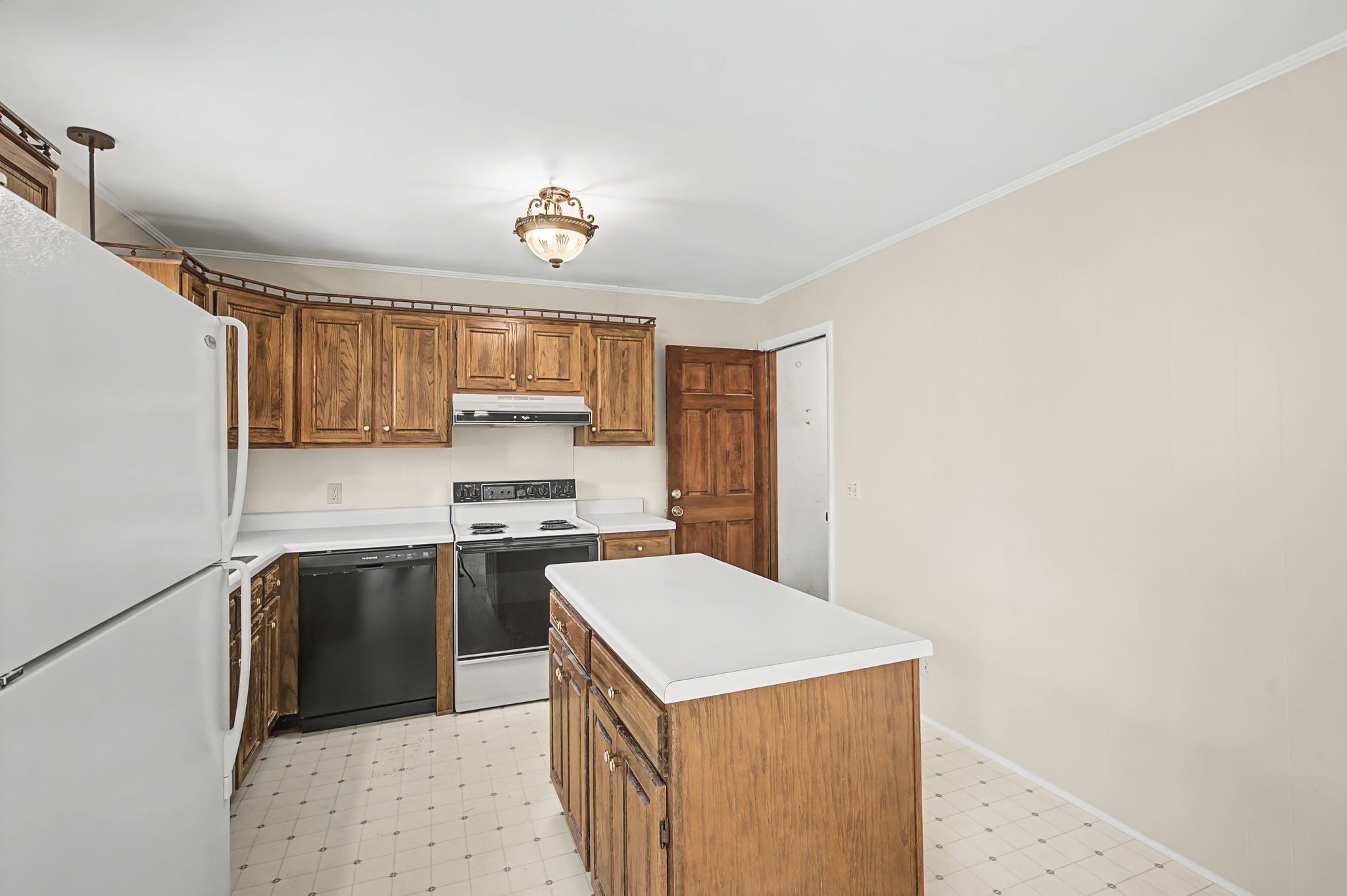 520 Holt Valley Road Nashville, TN 37209 - Photo 13 of 47 a kitchen with a stove a sink and a refrigerator