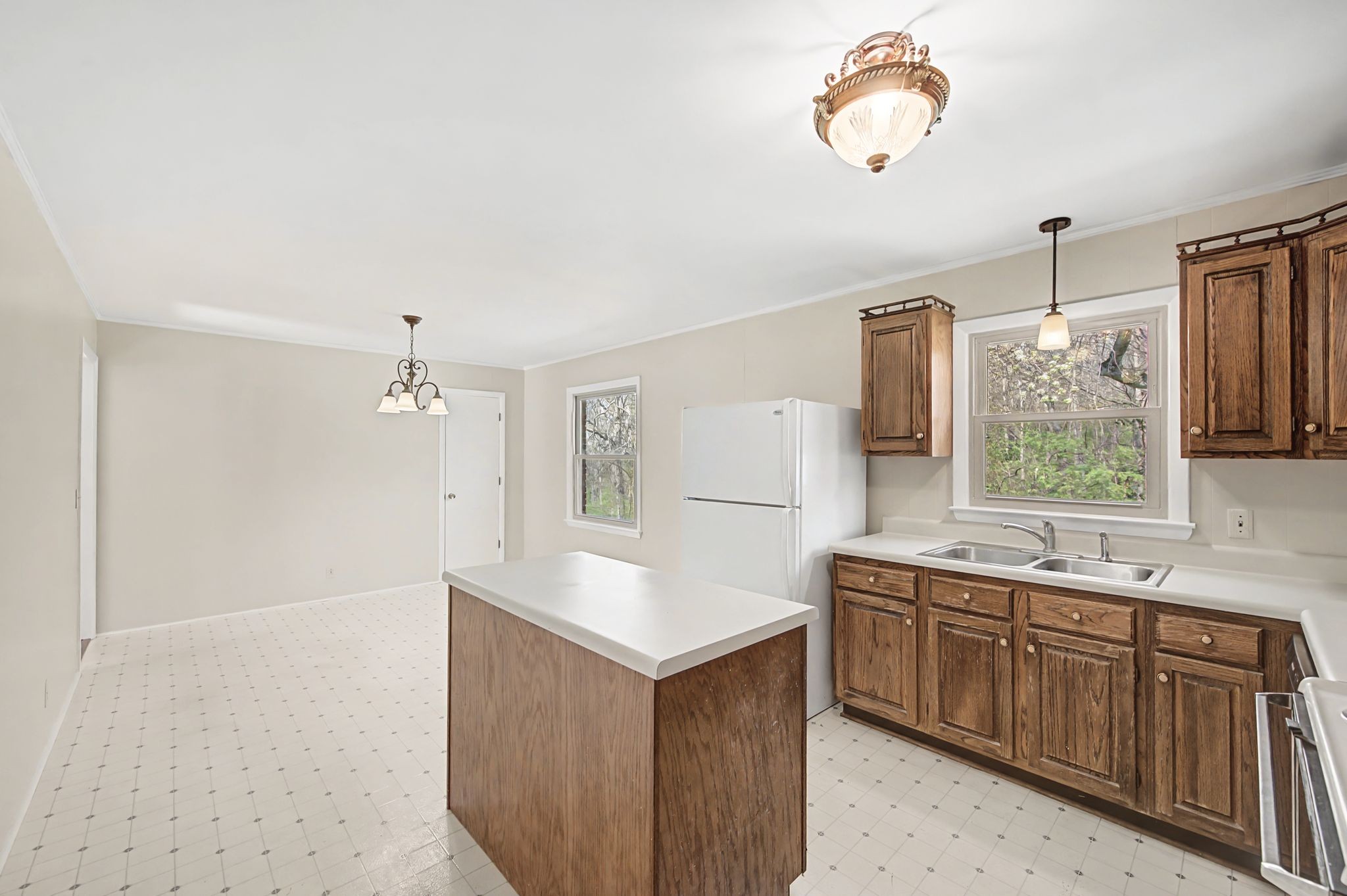 520 Holt Valley Road Nashville, TN 37209 - Photo 15 of 47 a kitchen with cabinets and window
