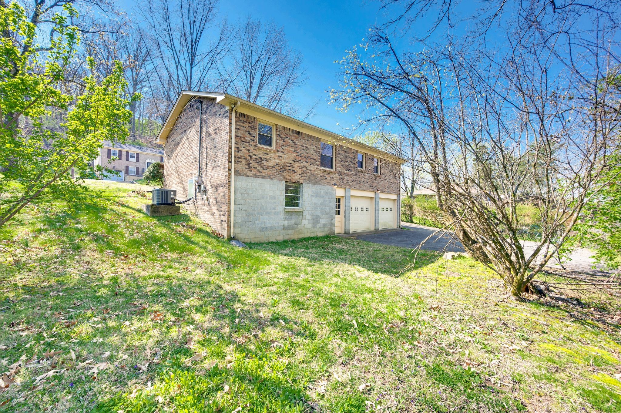 520 Holt Valley Road Nashville, TN 37209 - Photo 30 of 47 a view of a backyard with potted plants and large tree