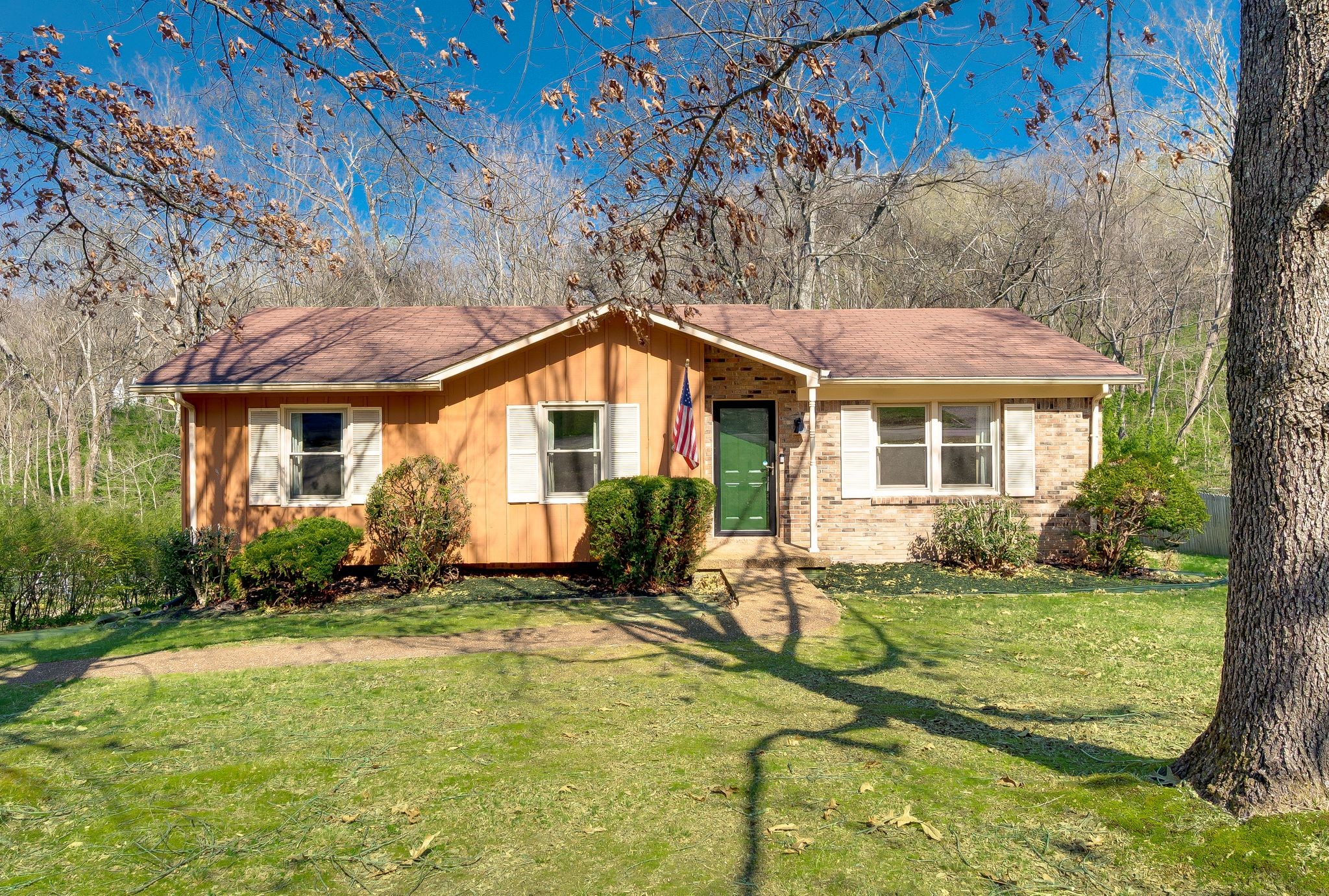 520 Holt Valley Road Nashville, TN 37209 - Photo 3 of 47 a view of an house with backyard space and garden