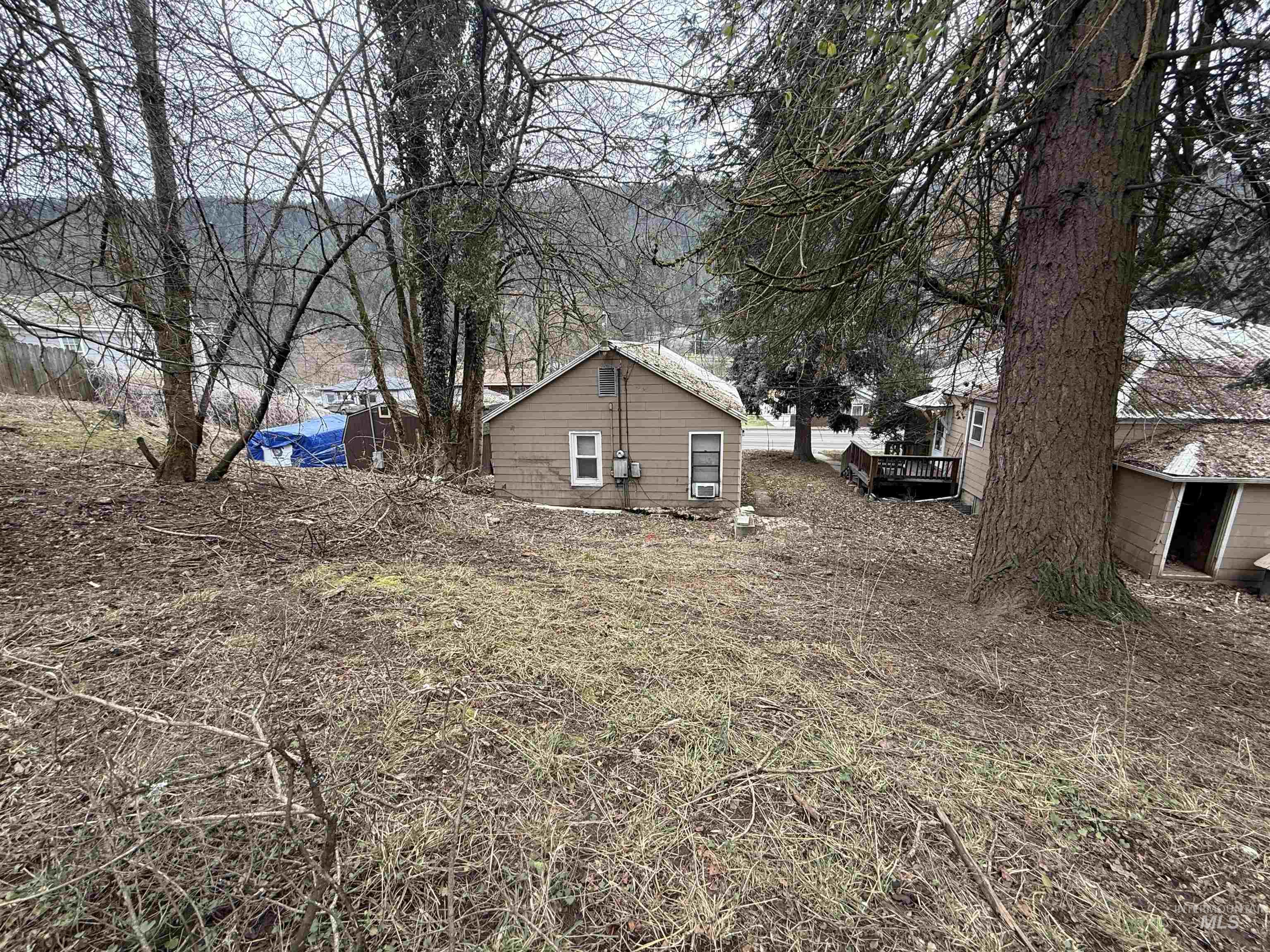 620 Riverside Avenue Orofino, ID 83544 - Photo 12 of 12 View of side of home featuring a wooden deck
