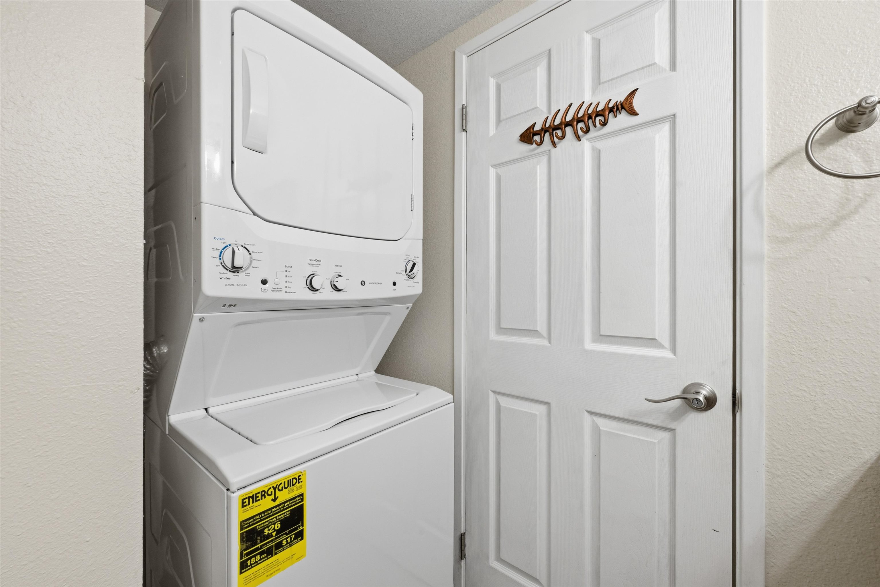 140 Uwapo Road, Unit 39101 Kihei, HI 96753 - Photo 21 of 35 a utility room with dryer and washer