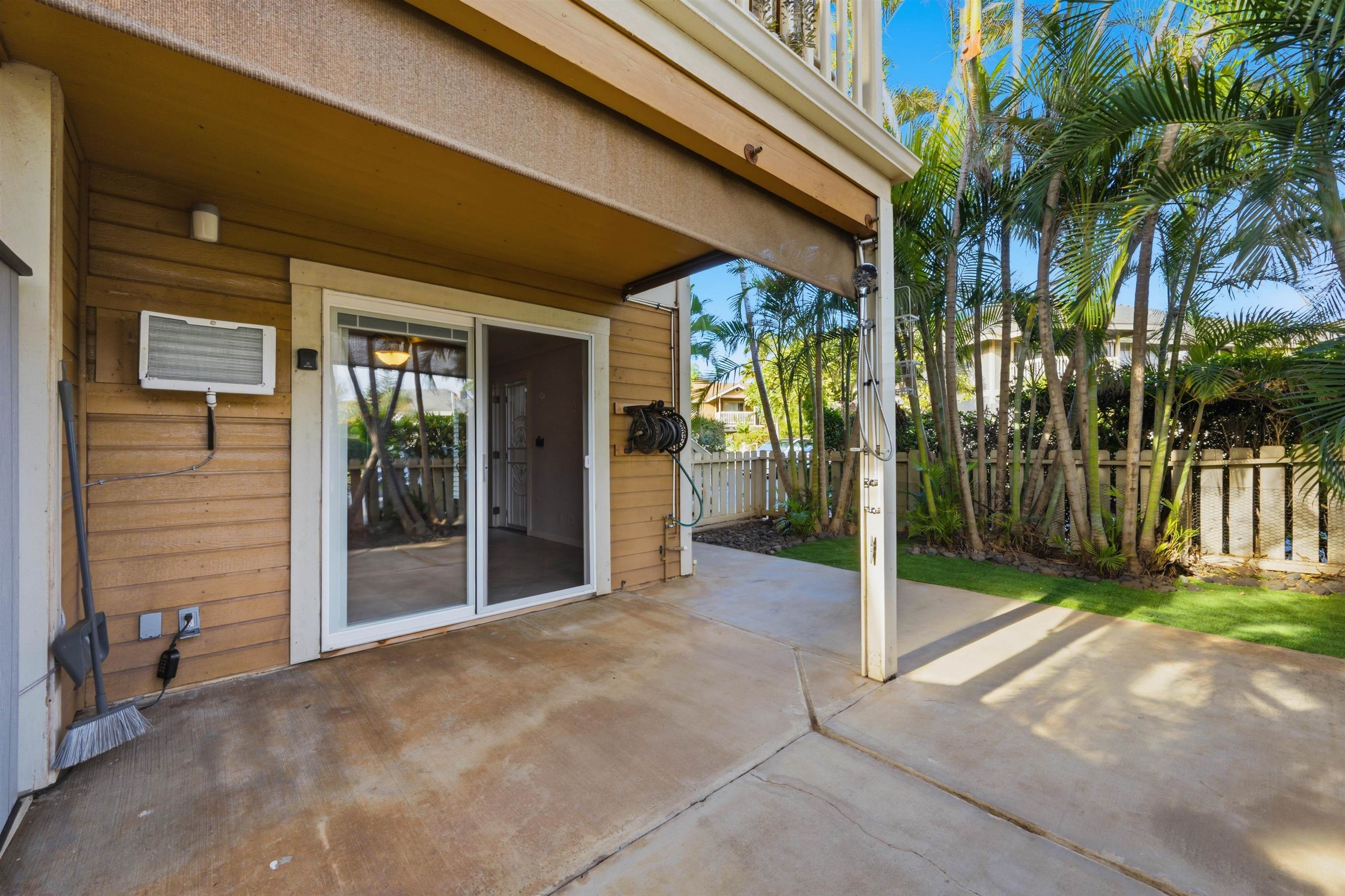 140 Uwapo Road, Unit 39101 Kihei, HI 96753 - Photo 27 of 35 a view of a house with a backyard