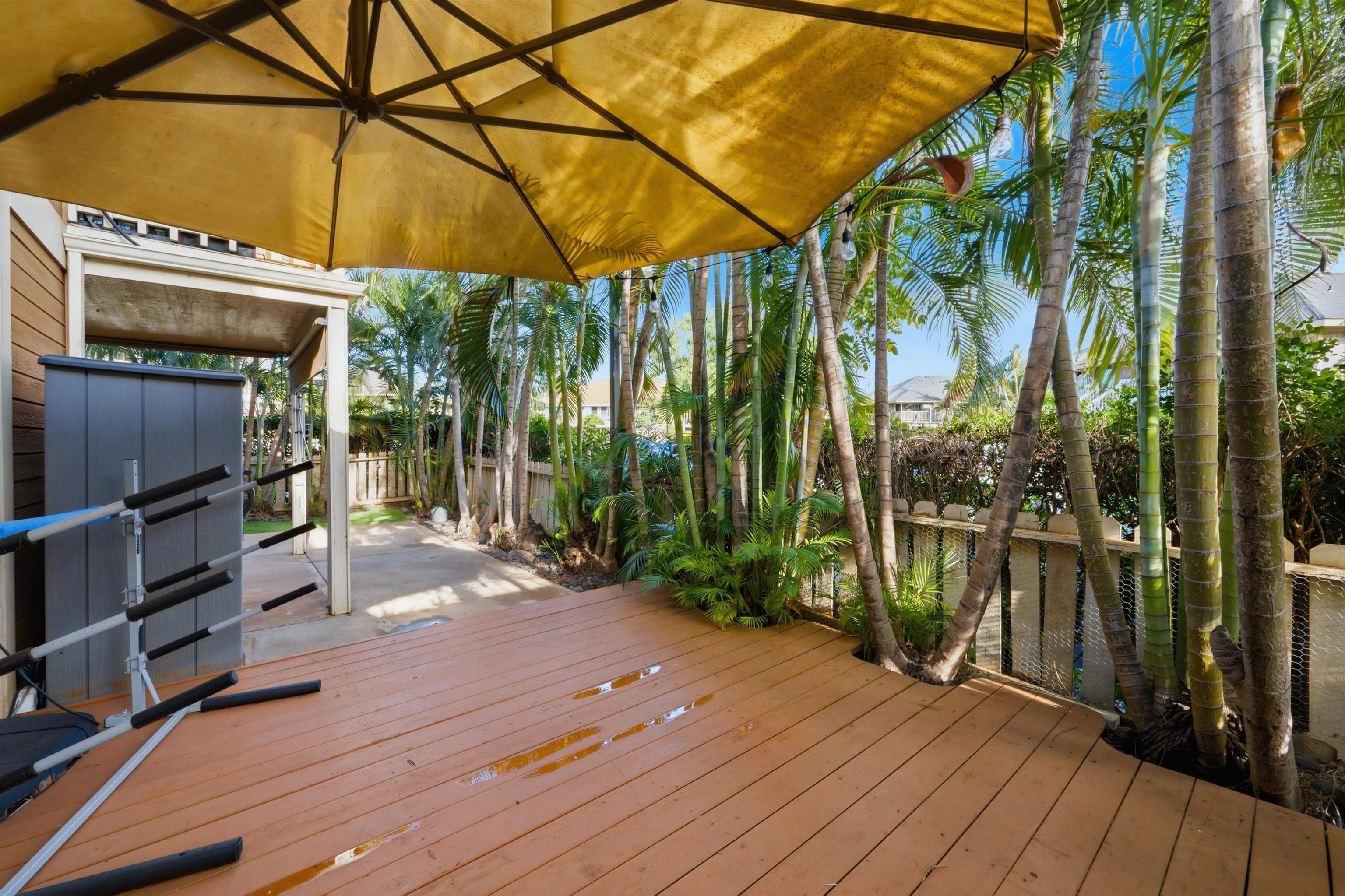 140 Uwapo Road, Unit 39101 Kihei, HI 96753 - Photo 30 of 35 a view of a house with a backyard