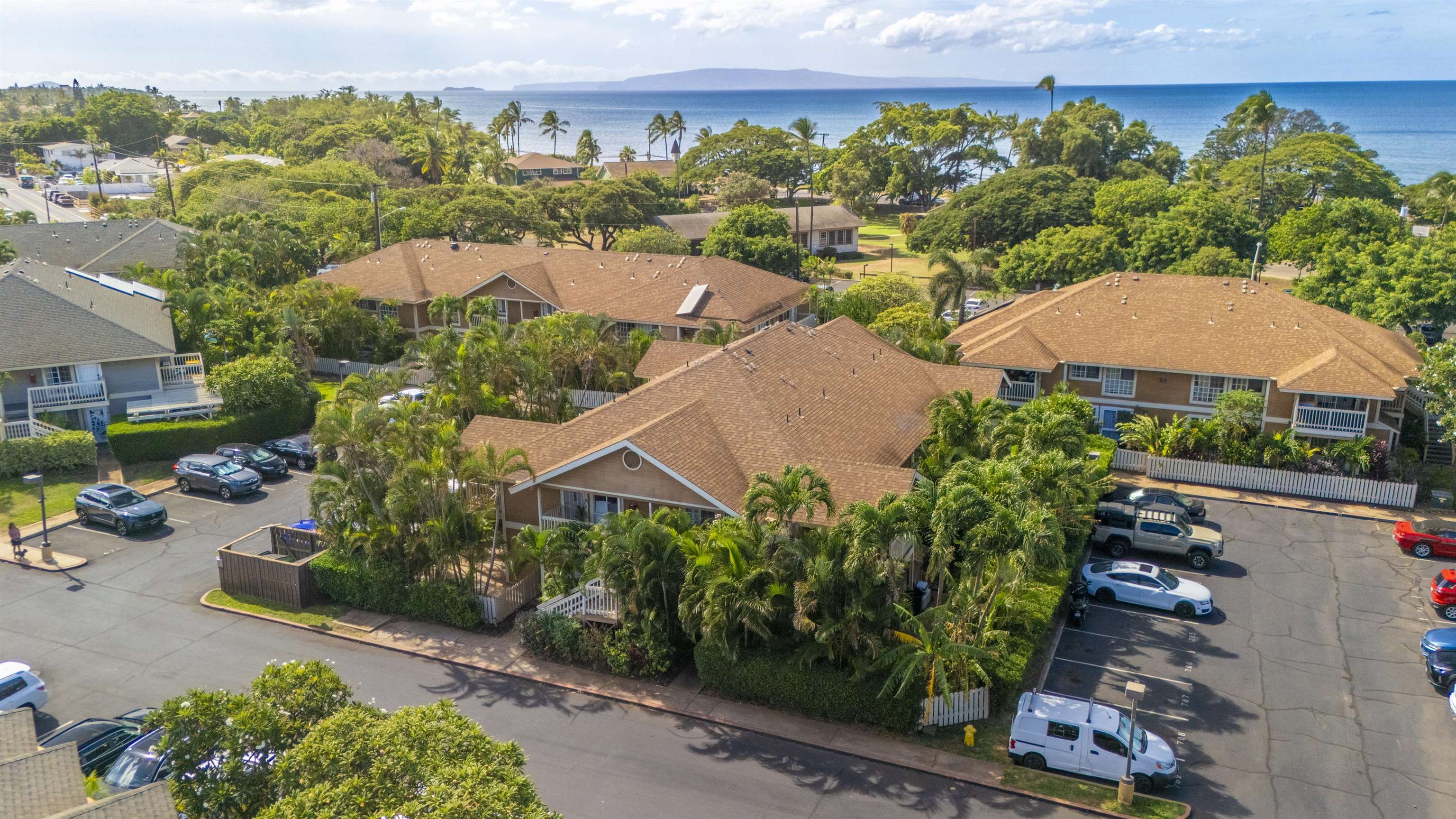 140 Uwapo Road, Unit 39101 Kihei, HI 96753 - Photo 32 of 35 an aerial view of a house with garden space and a street view