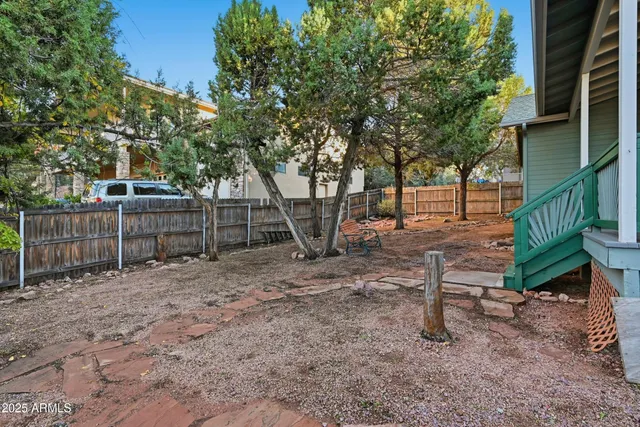 a view of balcony with wooden floor