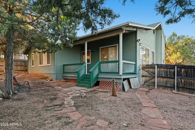 a view of balcony with wooden floor