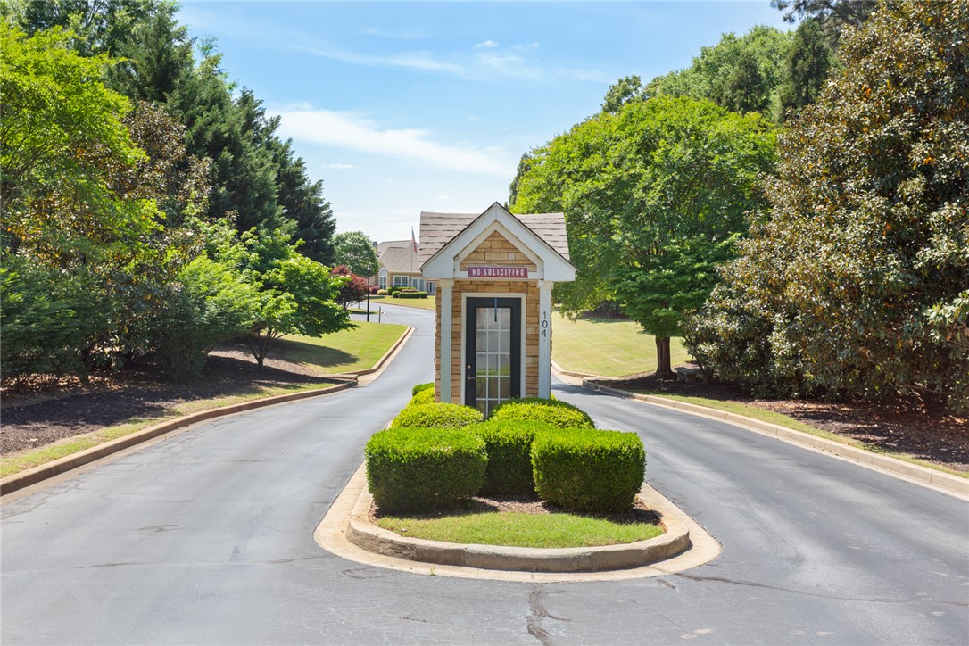 155 Life Style Lane Anderson, SC 29621 - Photo 43 of 49 Welcome home to this inviting community entrance, framed by mature trees and lush landscaping.