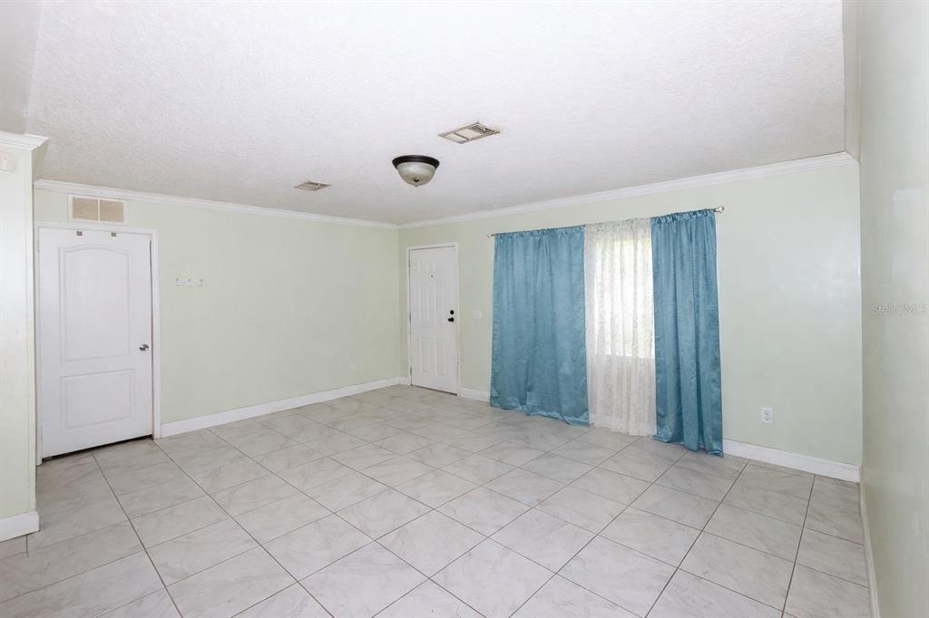 18057 Southwest 37th Street Dunnellon, FL 34432 - Photo 3 of 9 a view of an empty room and window