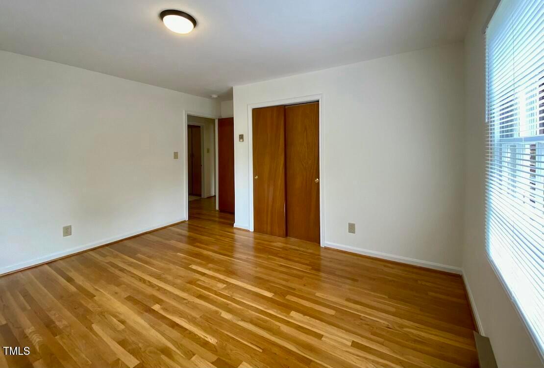 808 North Buchanan Boulevard, Unit B Durham, NC 27701 - Photo 20 of 23 a view of an empty room with a window