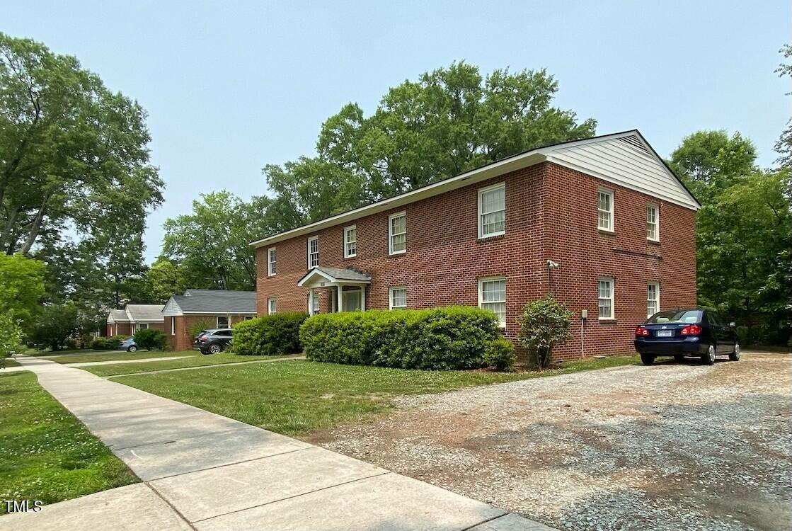 808 North Buchanan Boulevard, Unit B Durham, NC 27701 - Photo 2 of 23 a front view of a house with a yard