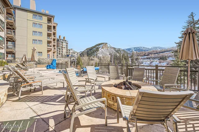 a view of a chairs and table on the terrace