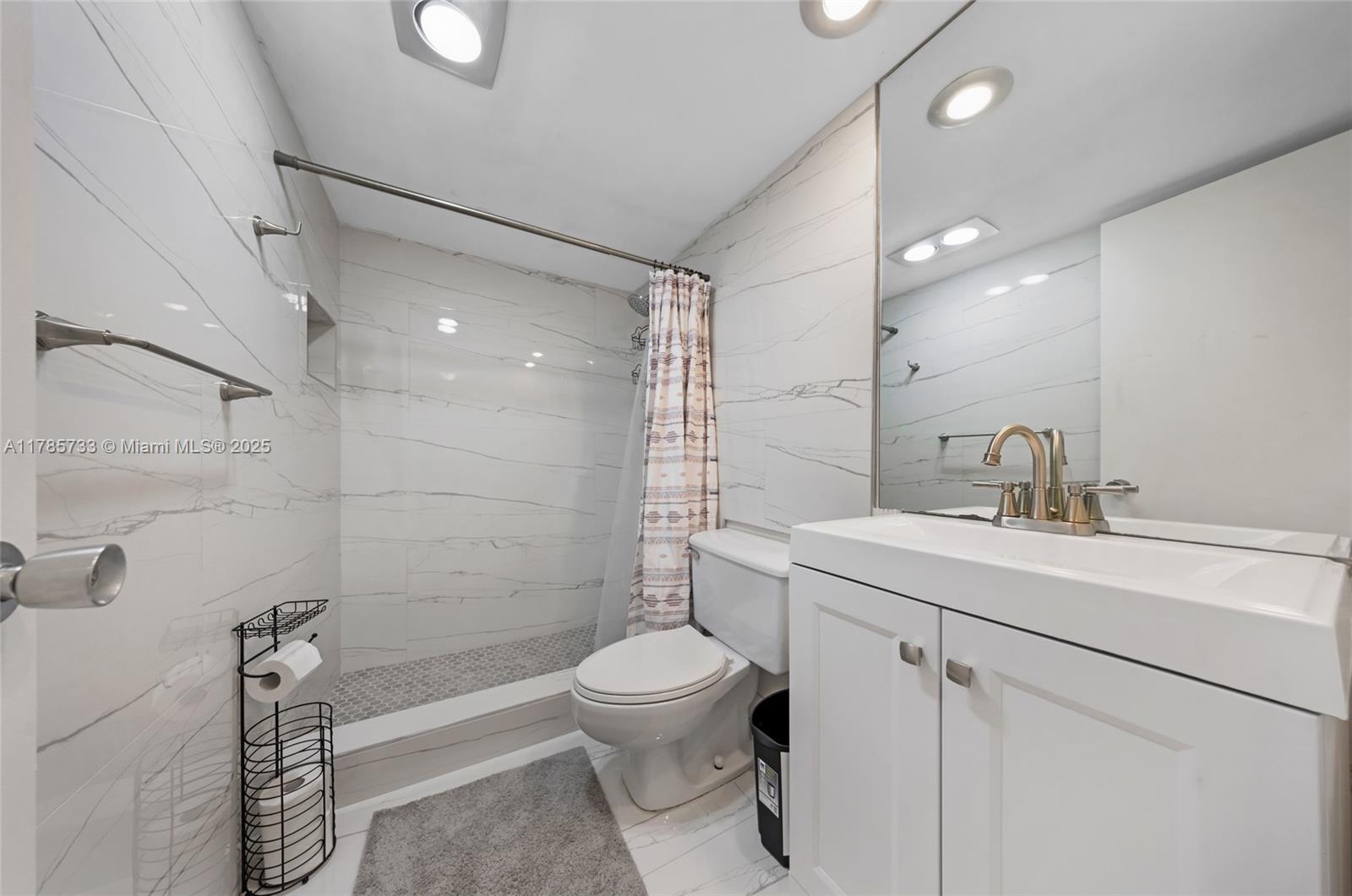 Palm Aire Pompano Beach, FL 33069 - Photo 20 of 27 a bathroom with a sink toilet and shower