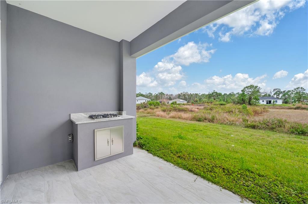650 Kraft Street Lehigh Acres, FL 33974 - Photo 28 of 29 a view of balcony with outdoor space
