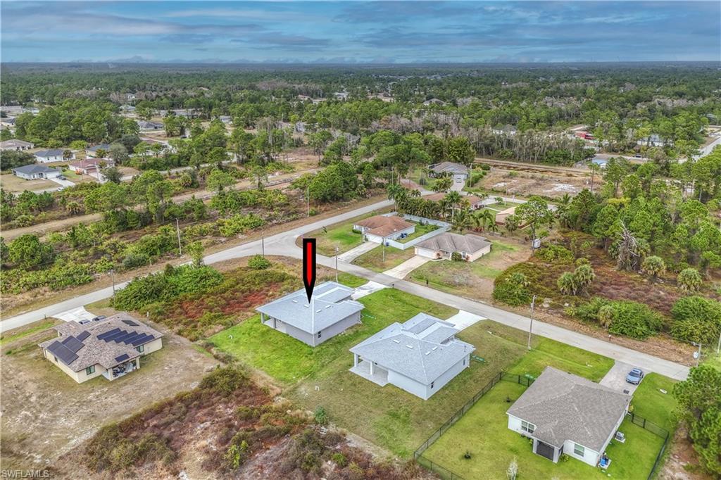 650 Kraft Street Lehigh Acres, FL 33974 - Photo 4 of 29 an aerial view of residential house with outdoor space