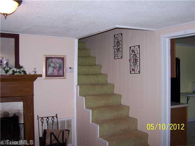 1828 Ray Wilson Road Sandy Ridge, NC 27046 - Photo 16 of 16 Other. Staircase upstairs bedrooms