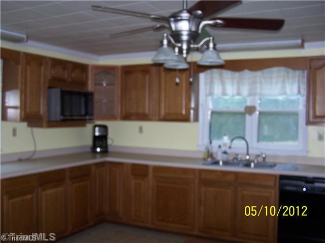 1828 Ray Wilson Road Sandy Ridge, NC 27046 - Photo 5 of 16 Kitchen. Large Eat In Country Kitchen